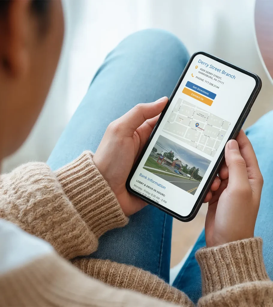 woman looking at web design on phone