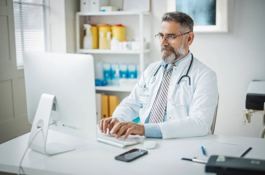 doctor at computer